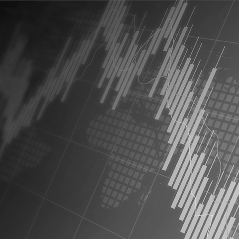 downward stock chart on top of a world map