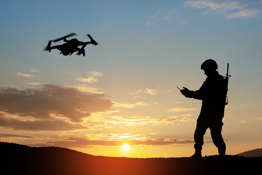 silhouette solider and drone